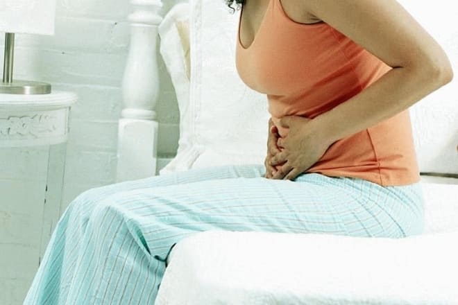 Боли в животе при овариальной кисте яичника после зачатия